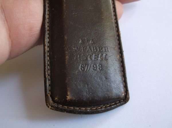 A COMPLICATED LOOKING VINTAGE A.W.FABER CASTELL SLIDE RULE IN LEATHER HOLDER ...COOL !!