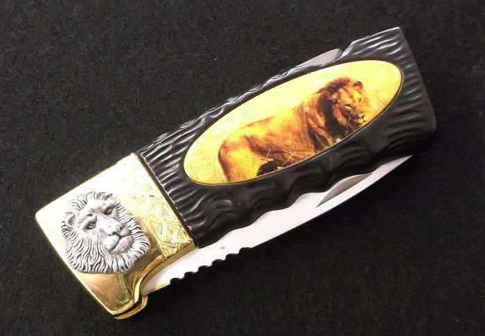 BIG 5 ...." LION " ....COLLECTORS KNIFE....GREAT BLADE....GOOD WEIGHT....AWESOME GIFT...WOW