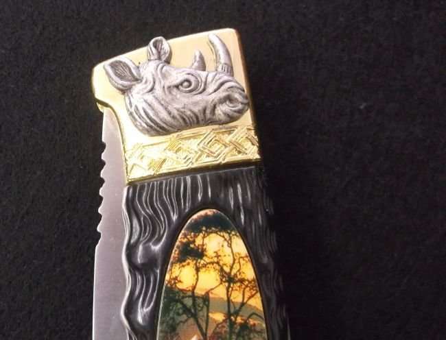 BIG 5 ...." RHINO " ....COLLECTORS KNIFE....GREAT BLADE....GOOD WEIGHT....AWESOME GIFT...WOW