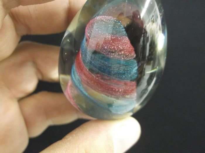 A SPLENDID VINTAGE EGG SHAPED SOLID GLASS PAPERWEIGHT / DUMP WITH SWIRLS INSIDE...SWEET !!!