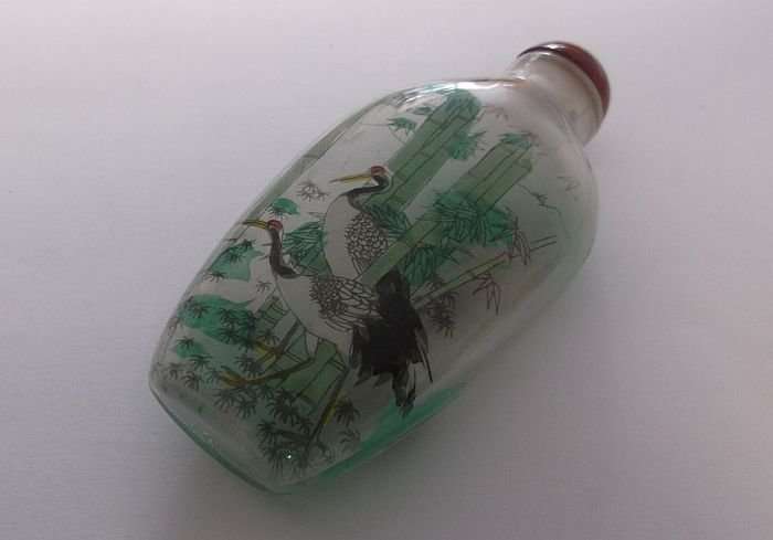 A FANTASTIC ORIENTAL GLASS SNUFF BOTTLE WITH WILD BIRD , BAMBOO AND FORREST DECORATION ...SWEET !!