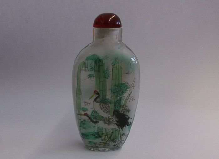 A FANTASTIC ORIENTAL GLASS SNUFF BOTTLE WITH WILD BIRD , BAMBOO AND FORREST DECORATION ...SWEET !!