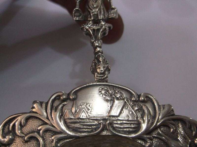 An old solid Dutch silver tea strainer with beautiful detail and applicable stamps
