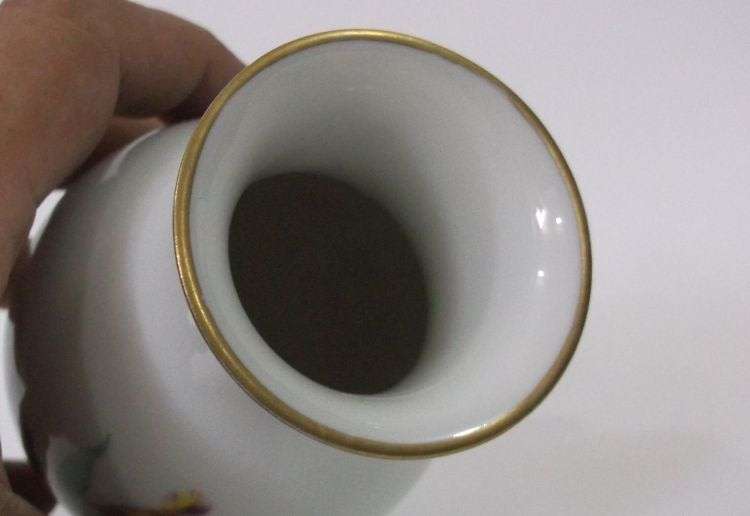A Vintage porcelain Vase by Lindner , Bavaria