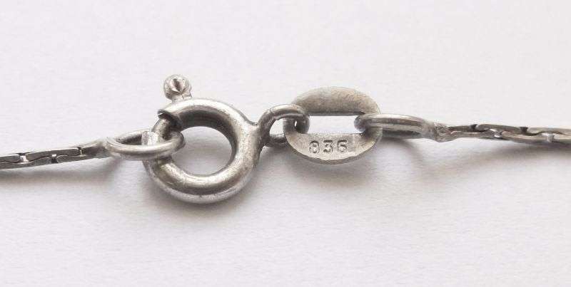 A vintage German silver necklace and a Sterling Silver pendant with a Fancy faceted Pear shape stone