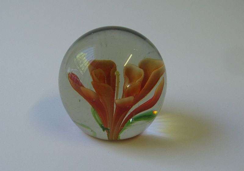 STUNNING !! A VINTAGE SOLID GLASS PAPERWEIGHT WITH ORANGE FLORAL DETAIL ...WOW !!