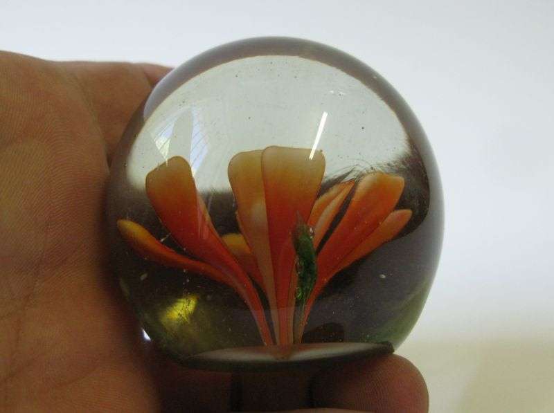 STUNNING !! A VINTAGE SOLID GLASS PAPERWEIGHT WITH ORANGE FLORAL DETAIL ...WOW !!