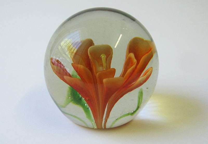 STUNNING !! A VINTAGE SOLID GLASS PAPERWEIGHT WITH ORANGE FLORAL DETAIL ...WOW !!