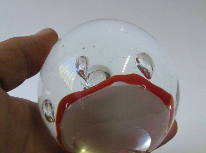 A FABULOUS VINTAGE SOLID GLASS PAPERWEIGHT WITH RED LAVA LOOK DECORATION AND BUBBLES !! WOW !!