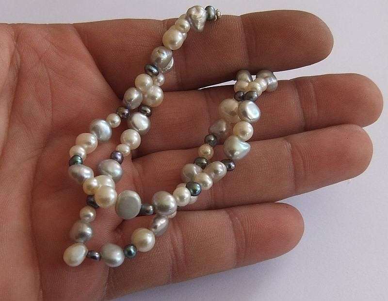 WOW !! AN ELEGANT DOUBLE STRAND GENUINE PEARL BRACELET WITH SOLID STERLING SILVER DESIGNER CLASP !!