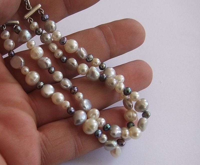 WOW !! AN ELEGANT DOUBLE STRAND GENUINE PEARL BRACELET WITH SOLID STERLING SILVER DESIGNER CLASP !!