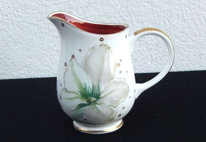 A rare milk jug by Susie Cooper of England