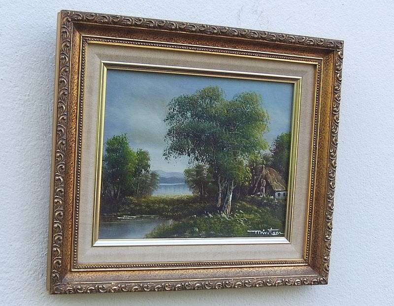A Vintage original oil on board depicting a tranquil river scene signed by the artist ...Stunning !!