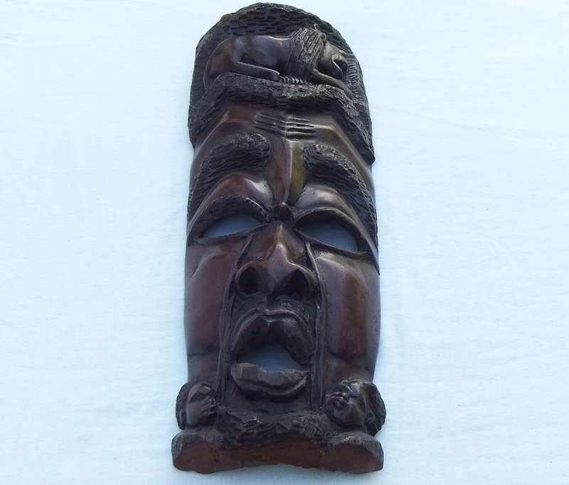 A big and heavy solid carved wood Vintage Traditional African mask with lots of detail !! WoW !