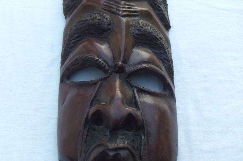 A big and heavy solid carved wood Vintage Traditional African mask with lots of detail !! WoW !