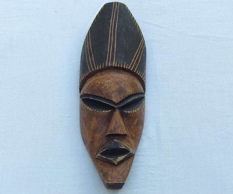 Wicked find !! A scary looking Vintage solid wood carved Traditional African mask