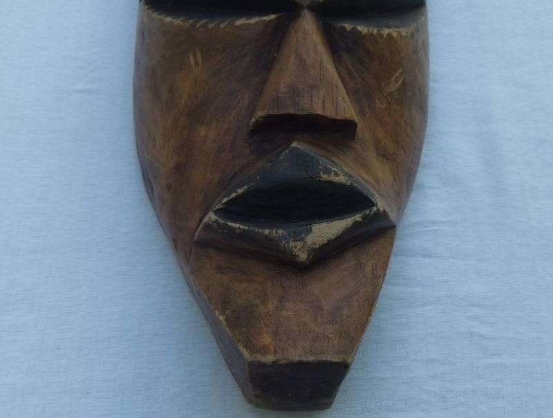 Wicked find !! A scary looking Vintage solid wood carved Traditional African mask