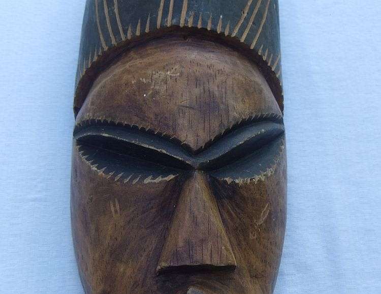 Wicked find !! A scary looking Vintage solid wood carved Traditional African mask
