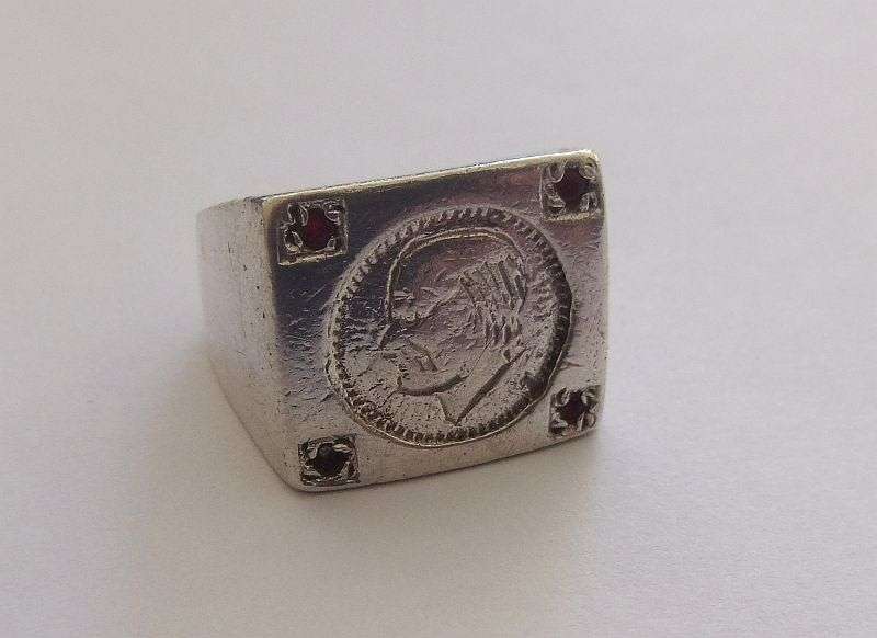 A TOTALLY COOL SOLID STERLING SILVER COIN RING SET WITH FOUR FACETED RED STONES !! WOW !!