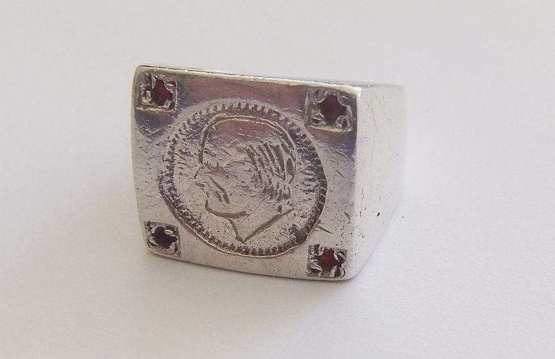 A TOTALLY COOL SOLID STERLING SILVER COIN RING SET WITH FOUR FACETED RED STONES !! WOW !!