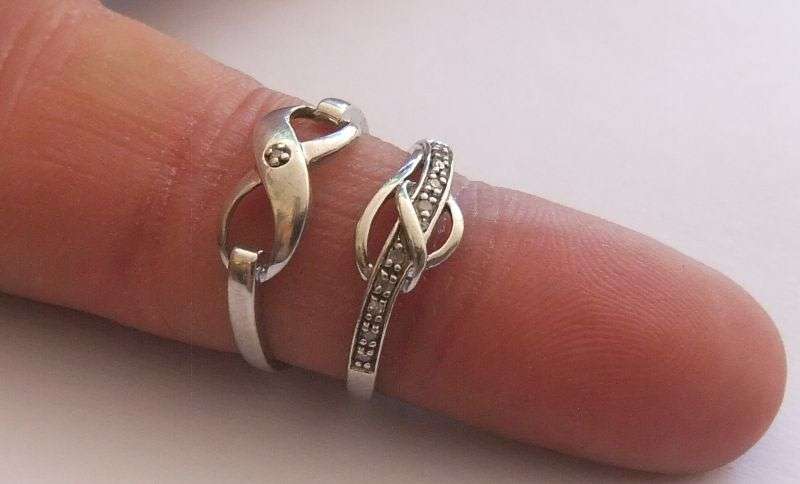 TWO STERLING SILVER RINGS - ETERNITY & FACETED STONES - BID FOR BOTH