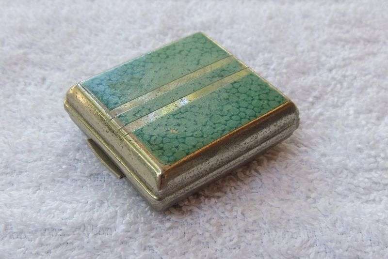 AN ART DECO STYLE / PERIOD SWISS FOLD UP TRAVELLING CLOCK - TICKS