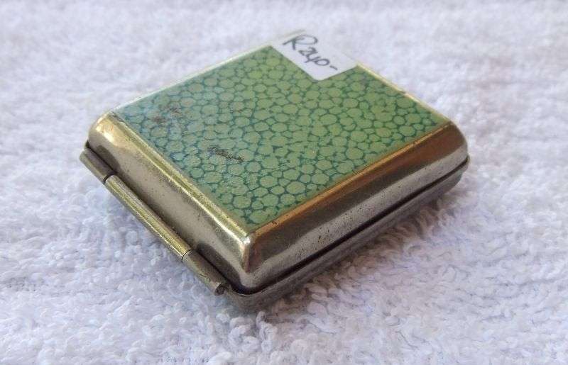 AN ART DECO STYLE / PERIOD SWISS FOLD UP TRAVELLING CLOCK - TICKS