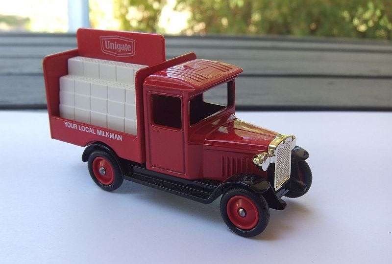 A VINTAGE DIE CAST METAL MODEL OF A MILK DELIVERY VAN BY LLEDO ENGLAND ...GREAT CONDITION !!
