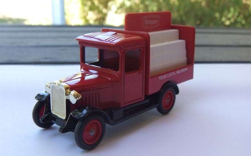 A VINTAGE DIE CAST METAL MODEL OF A MILK DELIVERY VAN BY LLEDO ENGLAND ...GREAT CONDITION !!