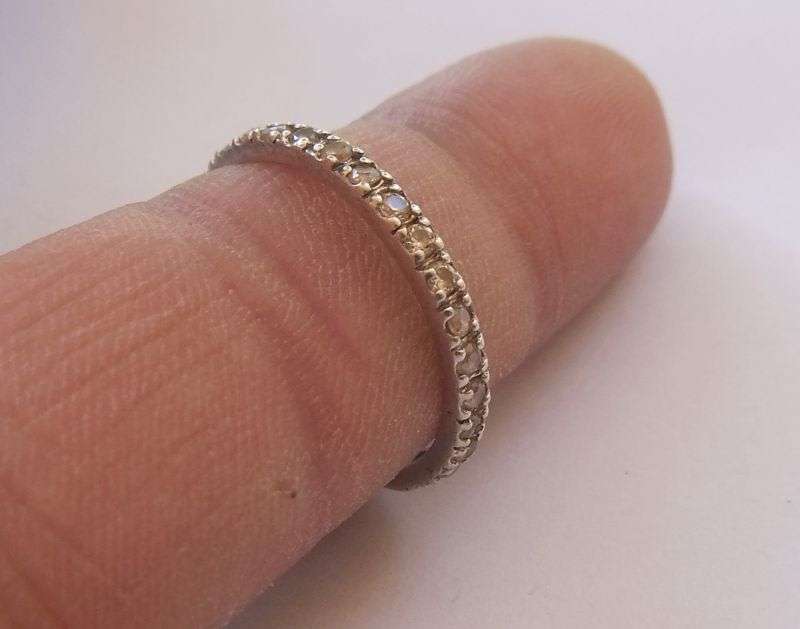 AN ELEGANT SOLID STERLING SILVER HALF ETERNITY RING TO ACCENTUATE YOUR OTHER BEAUTIFUL PIECES !!