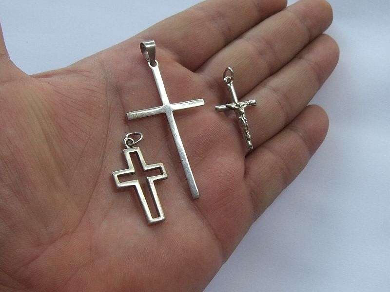DIVINE DEAL !! A LOT OF THREE SOLID STERLING SILVER CROSS PENDANTS ...ONE BID FOR ALL