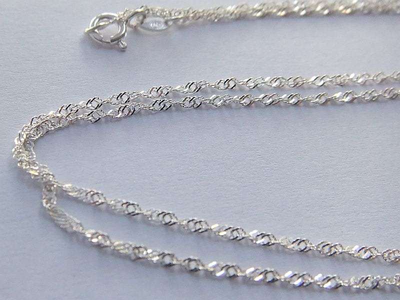 A LOVELY STERLING SILVER NECKLACE PLUS FOUR STERLING SILVER PENDANTS !! BID FOR THE LOT !! GOOD DEAL