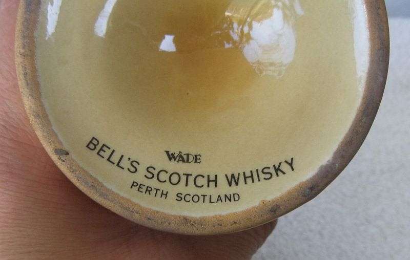 200 ML OF THE BEST !! A VINTAGE ""BELLS WHISKY"" IN A WADE PORCELAIN "BELL" SHAPED DECANTER - SEALED