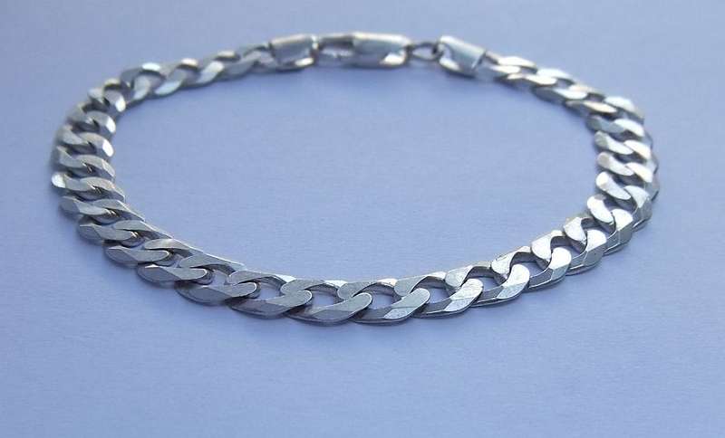 A SUPERIOR QUALITY WIDE WEIGHTY SOLID STERLING SILVER BRACELET WITH COOL CHAIN LINK SYSTEM !! WOW !!