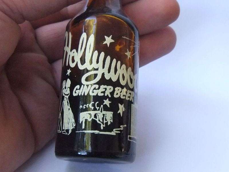 MADE IN JOHANNESBURG !! AFRICANA !! A VINTAGE MINIATURE " HOLLYWOOD " GINGER BEER BOTTLE !! WOW !!