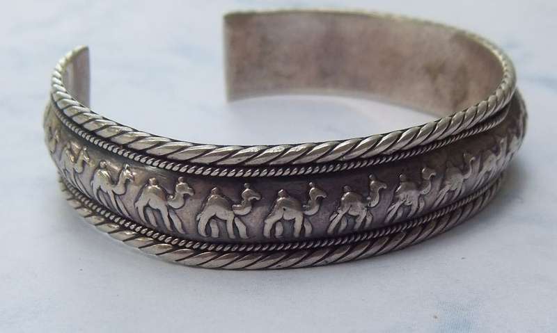 A COOL ADJUSTABLE CAMEL MOTIF CUFF BANGLE !! GOOD QUALITY !! GOOD WEIGHT !! ALL IN ALL A GOOD PIECE