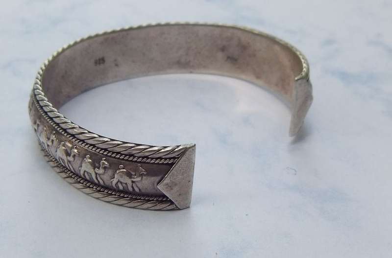 A COOL ADJUSTABLE CAMEL MOTIF CUFF BANGLE !! GOOD QUALITY !! GOOD WEIGHT !! ALL IN ALL A GOOD PIECE