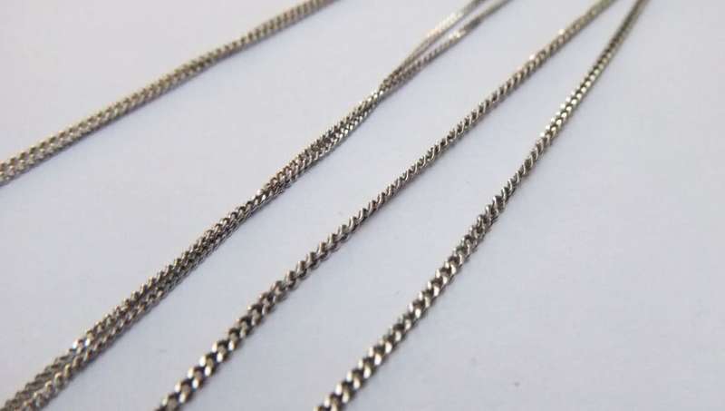 CRAZY DEAL !! THREE DAINTY STERLING SILVER NECKLACES WITH THREE STERLING SILVER PENDANTS !! COOL !!