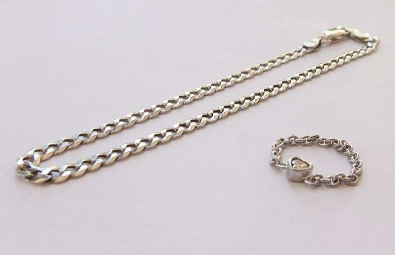 RARELY SEEN !! A STERLING SILVER DESIGNER CHAIN RING PLUS A STERLING SILVER BRACELET !! SWEET DEAL !