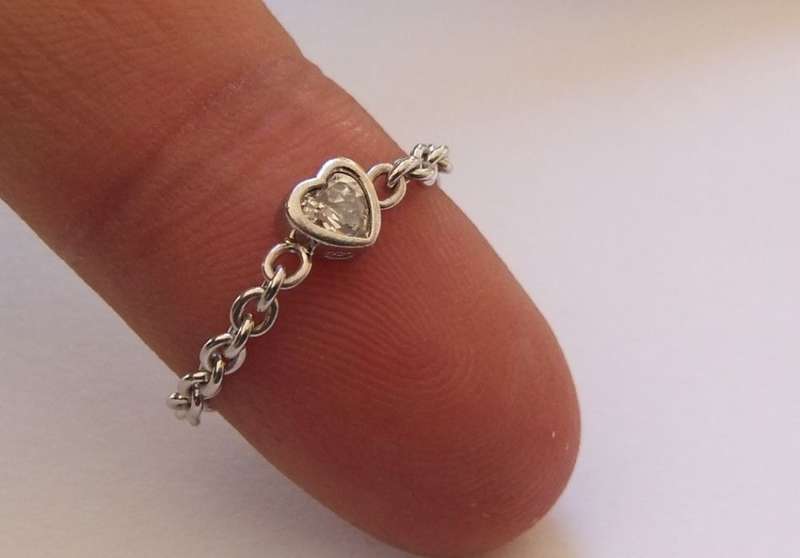 RARELY SEEN !! A STERLING SILVER DESIGNER CHAIN RING PLUS A STERLING SILVER BRACELET !! SWEET DEAL !