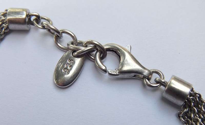 A SUPERIOR QUALITY DESIGNER MULTI STRAND BRACELET BY ESPRIT - STAMPED AND TESTED - HIGH VALUE