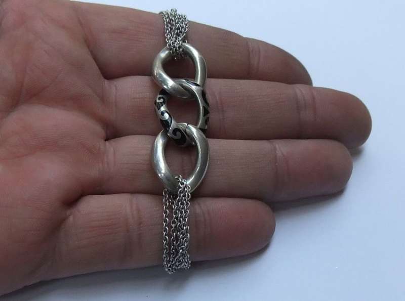 A SUPERIOR QUALITY DESIGNER MULTI STRAND BRACELET BY ESPRIT - STAMPED AND TESTED - HIGH VALUE