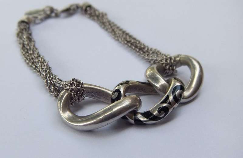 A SUPERIOR QUALITY DESIGNER MULTI STRAND BRACELET BY ESPRIT - STAMPED AND TESTED - HIGH VALUE