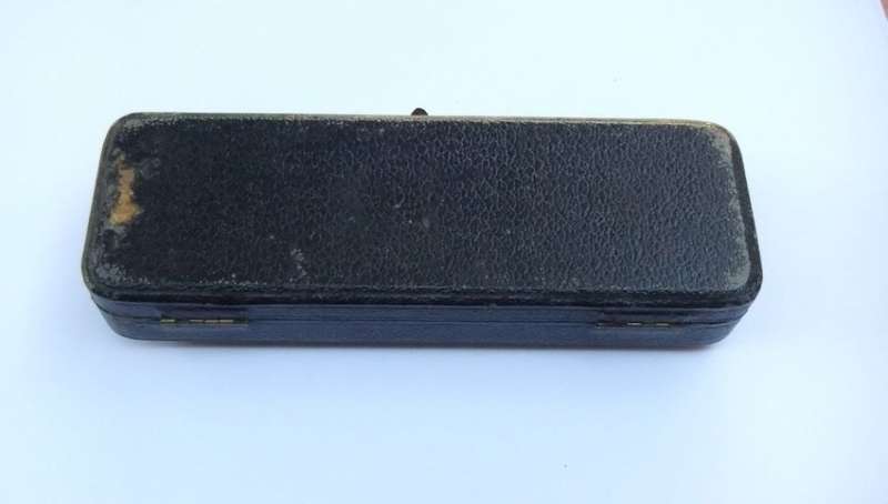 AN ANTIQUE BOX FOR A SILVER SPOON