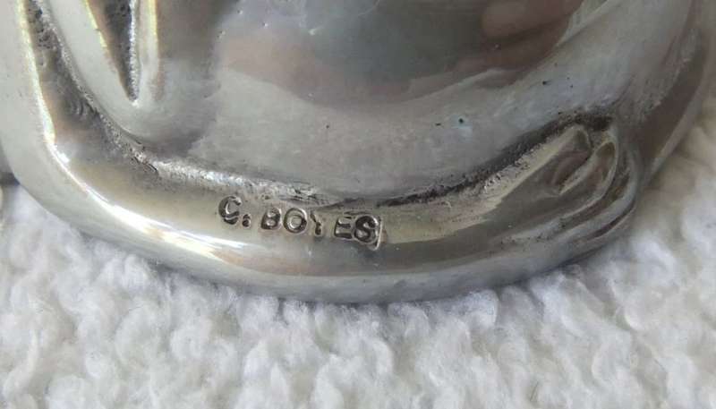 A GENUINE CARROL BOYES OPEN SALT AND SPOON - MAN & WOMAN MOTIF