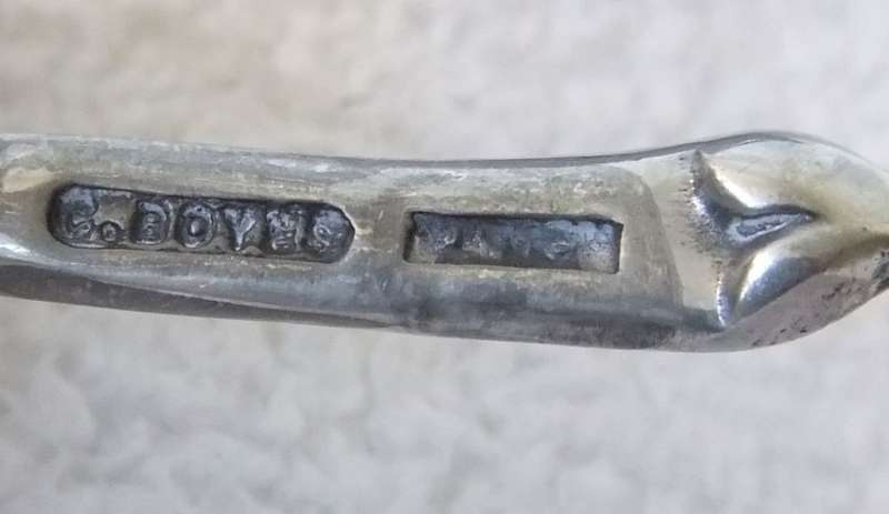 A GENUINE CARROL BOYES OPEN SALT AND SPOON - MAN & WOMAN MOTIF