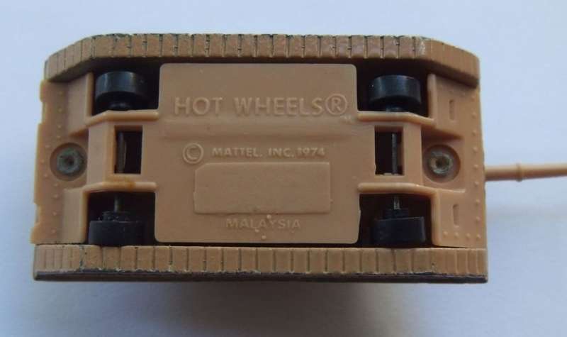 A VINTAGE 1974 MILITARY TANK BY HOWTHEELS