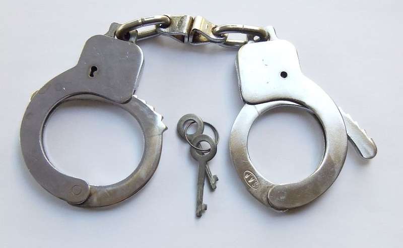 A SUPER COOL VINTAGE PAIR OF STAMPED GENUINE SAP HANDCUFFS IN GREAT WORKING CONDITION WITH KEYS !!