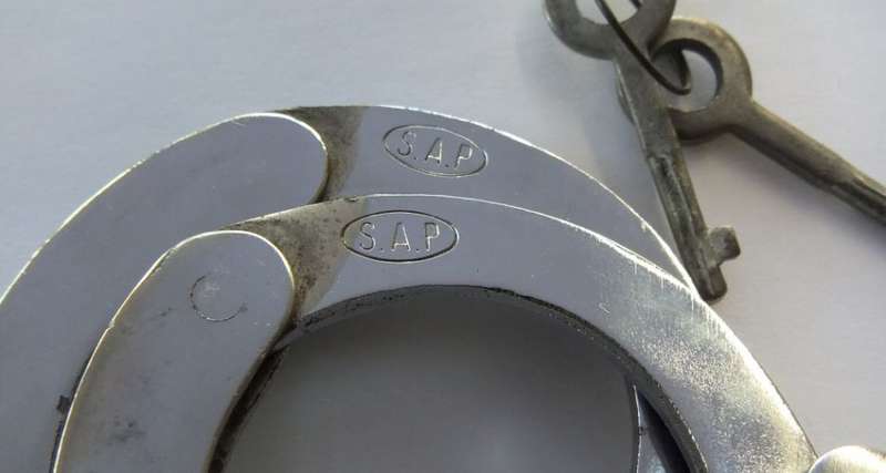 A SUPER COOL VINTAGE PAIR OF STAMPED GENUINE SAP HANDCUFFS IN GREAT WORKING CONDITION WITH KEYS !!