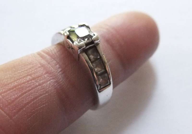 A LOVELY SOLID STERLING SILVER ENGAGEMENT TYPE RING SET WITH FACETED CZ STONES !! FREE COMBINING !!